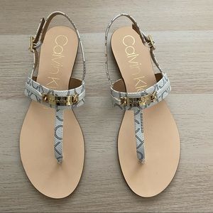 Calvin Klein Sandals. Size 8.5. Gold detail. Flat.